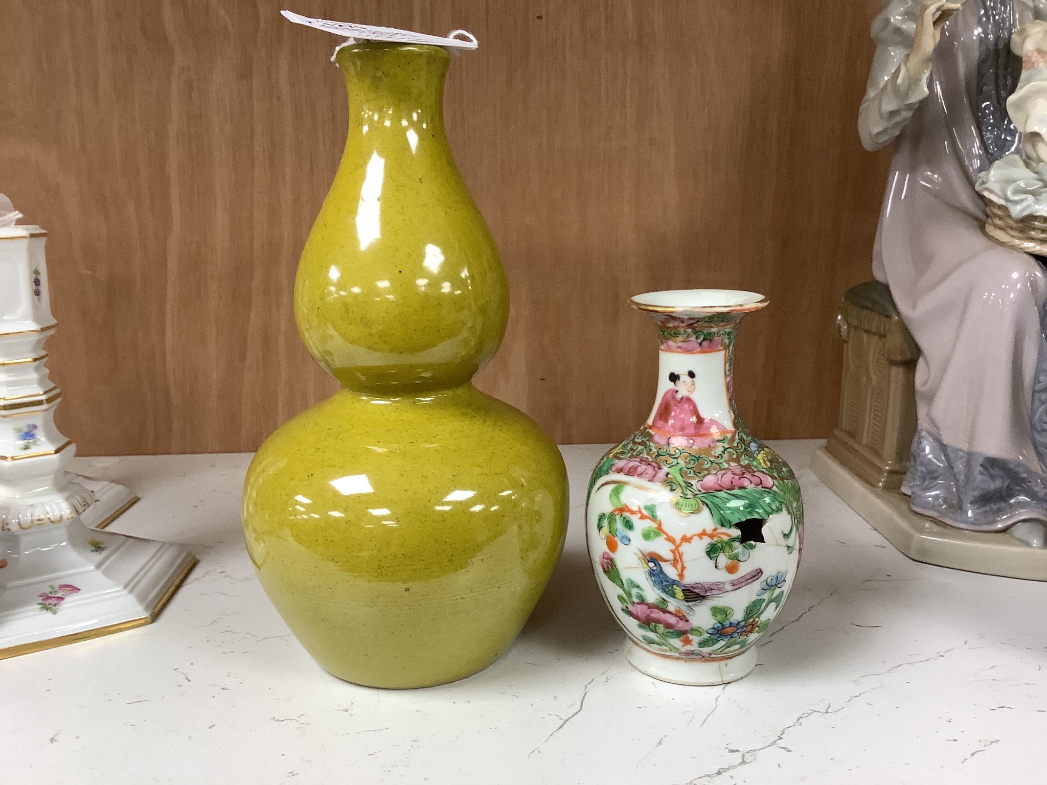 A Chinese yellow ground double gourd vase and a similar famille rose baluster vase, tallest 18cm